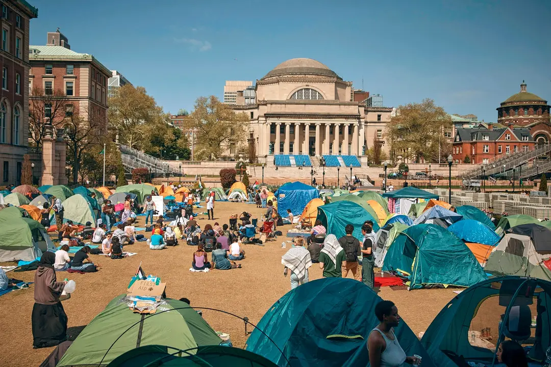 PHOTO: People listen to a speaker at a pro-Palestinian encampment, at Columbia University, on April 28, 2024, in New York. 